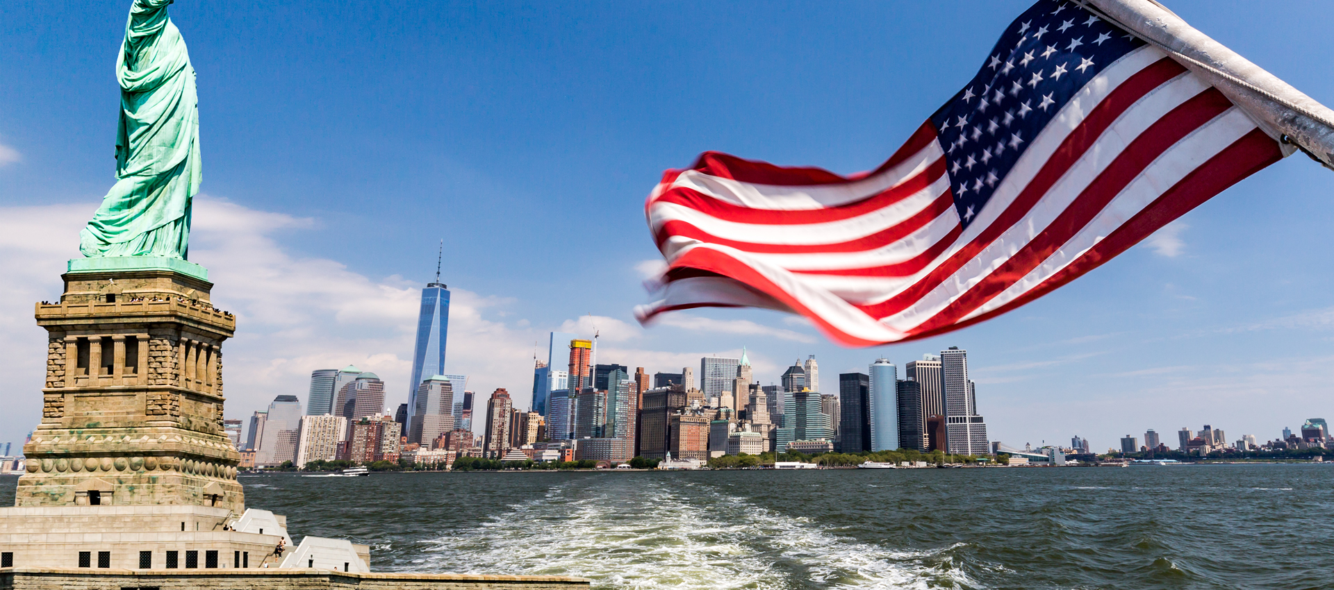 NYC Skyline, Statue Of Liberty, And American Flag